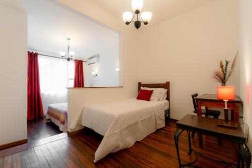 Catedral House | Habitación triple confort - Casa Esmeralda
