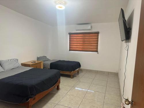 Juarez Municipality House | Habitaciones ENMA