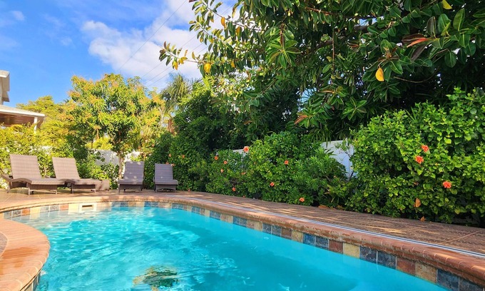 Redington Beach House | Handicap accessible house one minute from a beach with a heated pool.