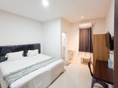Patrang Hotel | Happy Family Homestay Jember Mitra RedDoorz