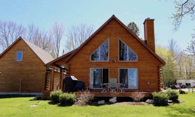 Burt Lake House | Harkness Waterfront Cabin on Burt Lake - Shore station and mooring!