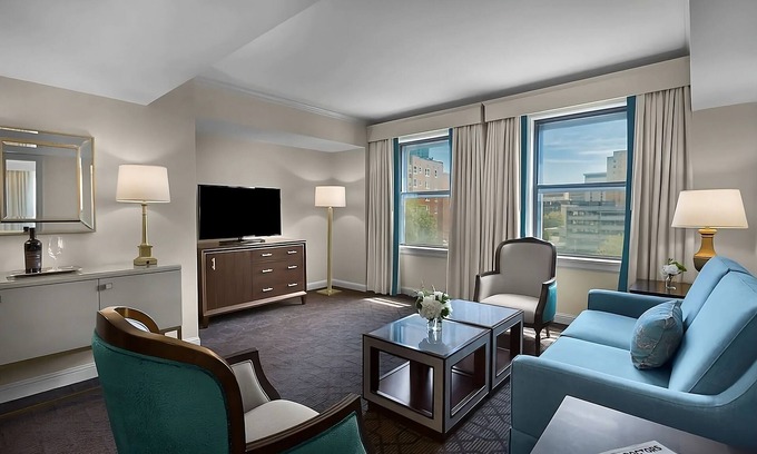 Central West End Hotel | Haven of Relaxation! Pets Allowed! With Parking, Pool, and Cinema!