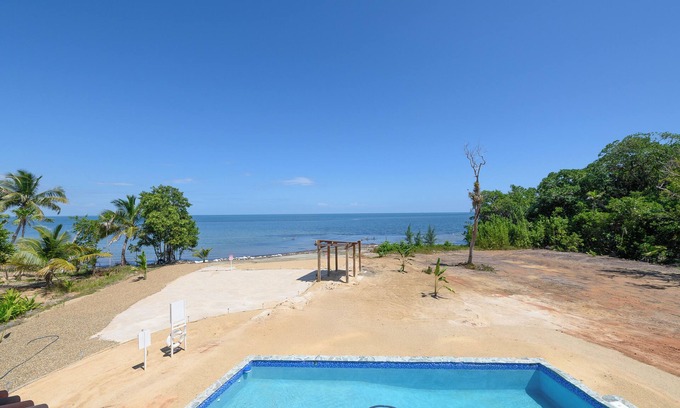 Sittee River House | Hawkz House Unit 2: Oceanfront 3-bedroom House with pool,AC, and wifi