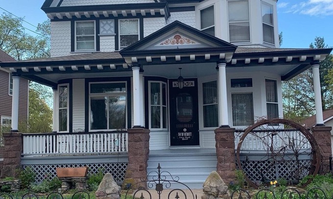 Marquette House | Hewitt Onion Tower Victorian charm in heart of Marquette- Cozy Fireplace