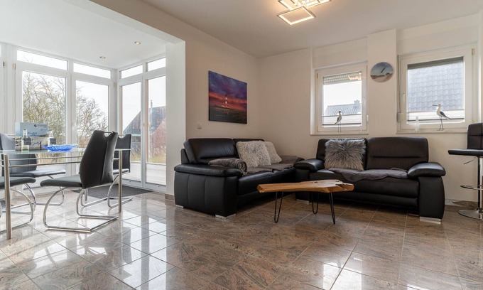 St. Peter-Ording Apartment | High-quality 3-room ground floor apartment directly on the dike with terrace for 4 pers.