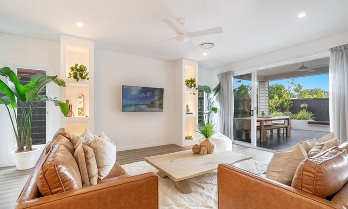 North Creek Apartment | Highlighted by a private outdoor entertaining space with a heated outdoor spa.