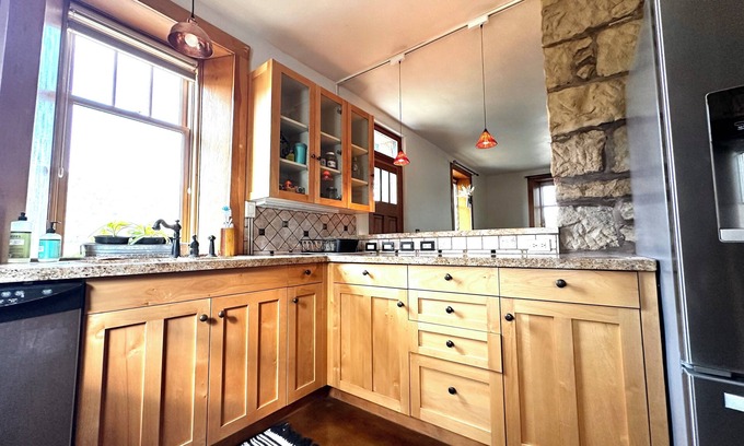 Cortez House | Historic Stone Home Under Bright Canyon Skies