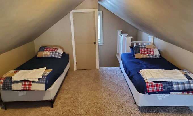 Sioux Falls House | Historic Twin Tudors Inn Northwest Room w/Loft (KP1400Loft)