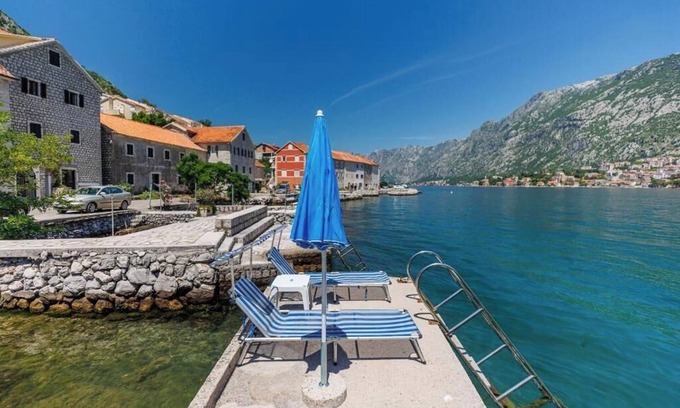 Kotor House | Historic waterfront house near Kotor with a private swimming pier