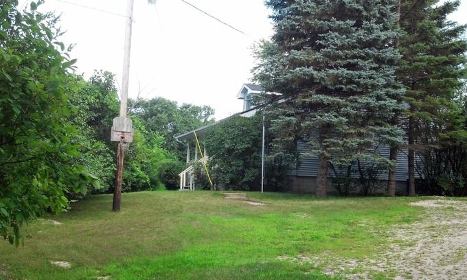 Pine Island House | Hobby Farm Country Getaway 2 Bedroom Basement Apartment in Large Farmhouse