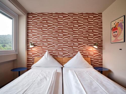 Waldsee Hotel | HOKK Hotel im Sportpark