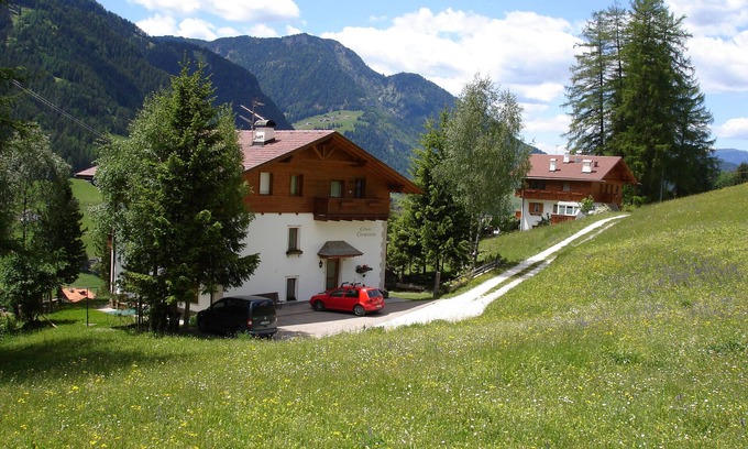 Ortisei Apartment | Holiday Apartment "Cësa Gravina Jubas" with Mountain View, Garden & Wi-Fi