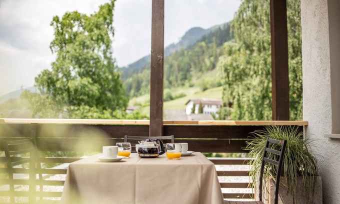 Santa Valburga Apartment | Holiday Apartment 'Pöder Alplahner' with Mountain View, Balcony, Shared Garden & Wi-Fi