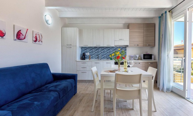 Trinita d'Agultu e Vignola Apartment | Holiday Apartment “Sa Domo Mea Isola Rossa” with Sea View and Air Conditioning