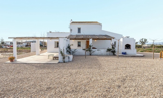 Sant Jaume d'Enveja House | Holiday Home 'Mas Midó' with Mountain View, Wi-Fi and Air Conditioning