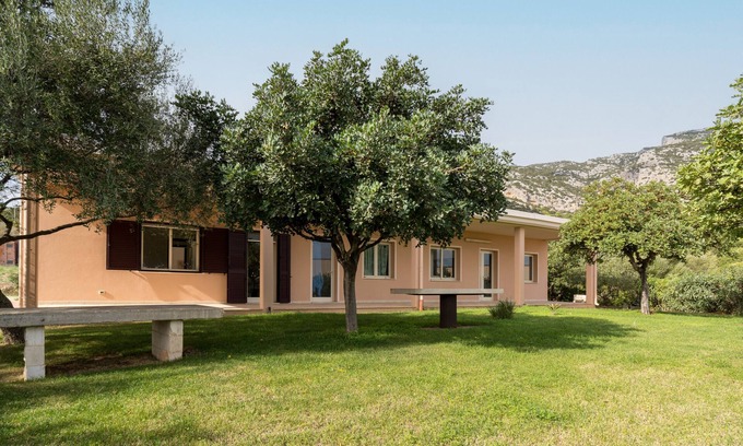 Orosei House | Holiday Home "Casa in Campagna Totale Relax" with Sea View, Private Garden & Wi-Fi
