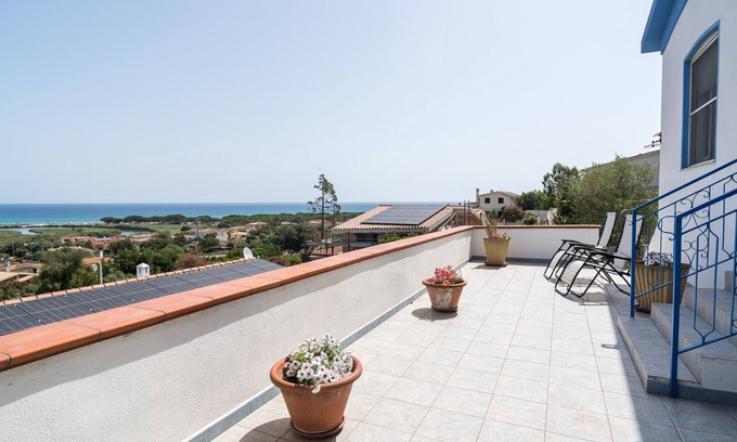 Iscra e Voes House | Holiday Home 'Casa Sa Petra Ruja' with Sea View, Private Terrace and Private Garden