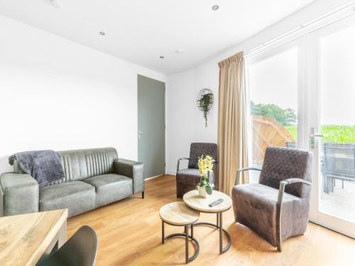 Municipality of Goirle House | Holiday Home in Forested Netherlands with Terrace, cleaning included