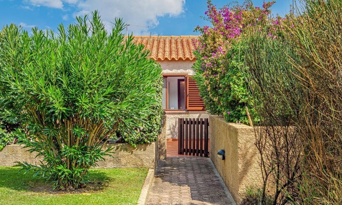 Palau House | Holiday Home 'La Casedda Di Nina' with Sea View, Private Terrace and Air Conditioning