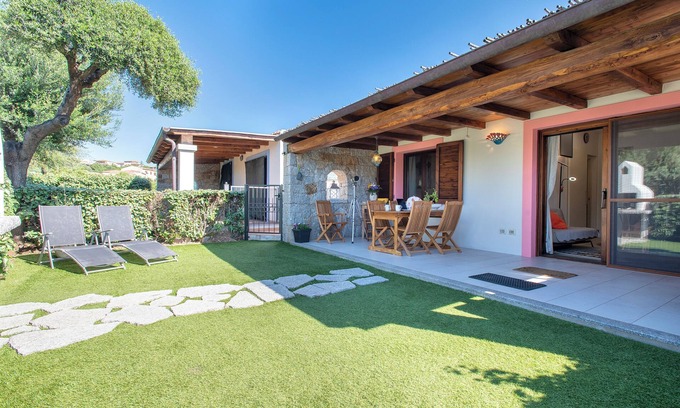 Badesi House | Holiday Home 'Manessy' with Sea View, Shared Pool and Air Conditioning