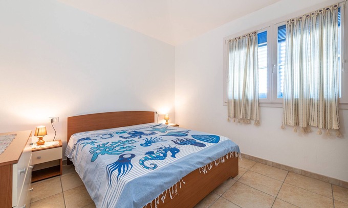 Calasetta House | Holiday Home "Sottotorre 3" close to the Sea with Private Garden & A/C