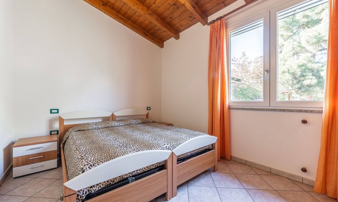 Porto Pino House | Holiday Home 'Villetta Ghisu' with Private Terrace, Private Garden and Air Conditioning