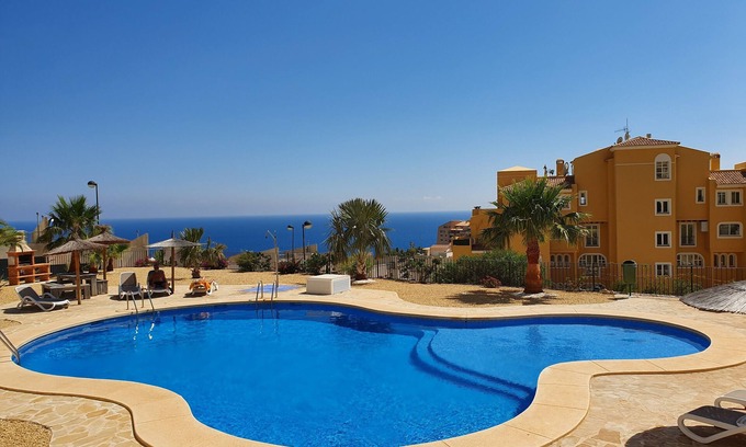 Pueblo Mascarat Apartment | Holiday Jazmines Apartment with pool and sea view