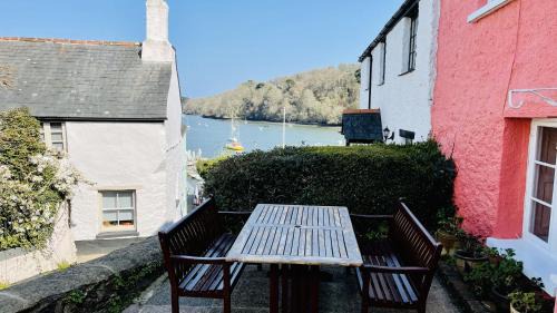 Dittisham House | Holly Cottage - characterful cottage a stones throw from river Dart with front & back patios