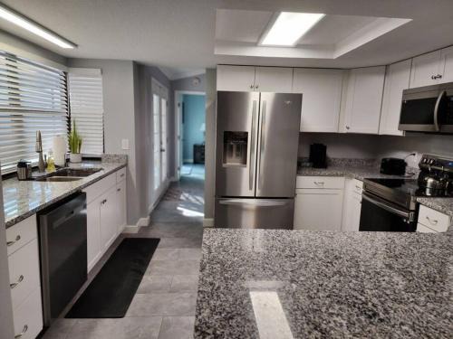 Orchid Lake Village House | Home Away from Home with Heated Pool