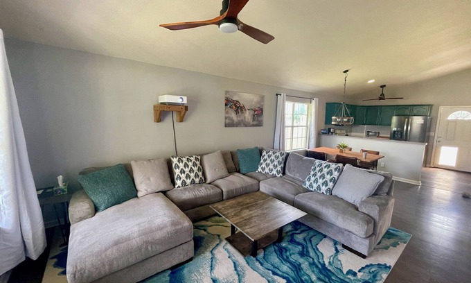 Alpine House | Home Theatre with King Bed