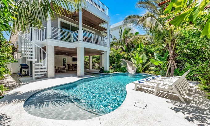 Sarasota House | Home with Waterslide, Heated Pool, Spa, Rooftop, Steps to Beach - Sea The Light