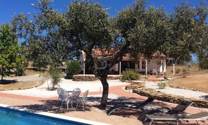 Aldeia dos Palheiros Ski Chalet | Homerez - Chalet for 5 ppl. with swimming-pool, jacuzzi and garden at Ourique