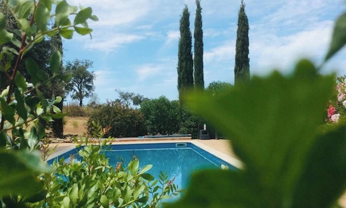 Aldeia dos Palheiros Ski Chalet | Homerez - Chalet in the heart of Ourique countryside with private pool