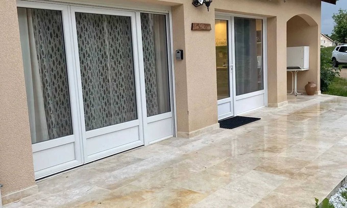 Lapte Apartment | Homerez - Renovated Apartment in Lapte with Terrace 40 m²