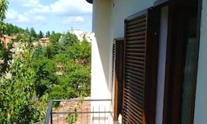 Monticello Amiata Apartment | Homerez - Spacious apartment with garden and balcony