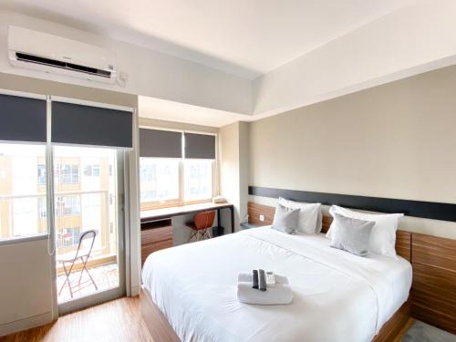 Duren Sawit Apartment | Homey and Simply Look Studio Gateway Park LRT City Jatibening Apartment By Travelio
