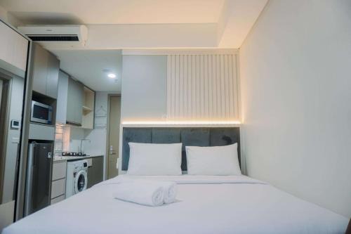 Pantai Indah Kapuk Apartment | Homey and Warm Studio at 28th Floor Gold Coast Apartment By Travelio