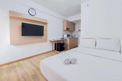 South Tangerang Apartment | Homey Studio (No Kitchen) Urbantown Serpong Apartment By Travelio