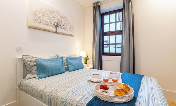Guimaraes Apartment | HostWise - Cozy and Bright Flat