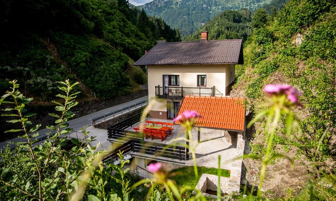 Podbrdo House | House Apartmaji Utrinek - with playroom, garage, terrase, sauna and jacuzzi