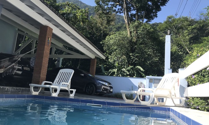 Guaeca House | House in Guaecá - seven suites, with air conditioning in the bedrooms and pool.