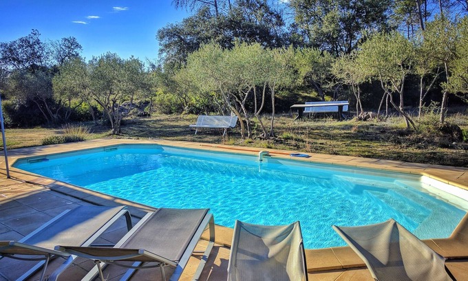 Saint-Bauzille-de-Montmel Villa | House view over cliff and olivette
