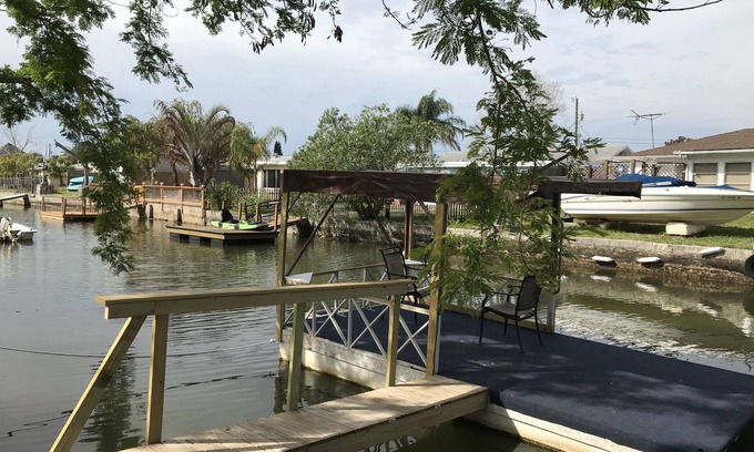 Hudson House | Hudson Beach Waterfront House with dock and canoe