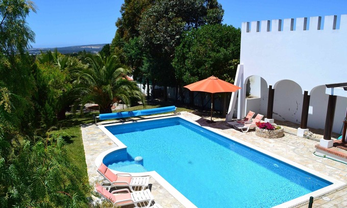 Coto Apartment | Huge salt water heated pool, BBQ, WiFi, child focussed.