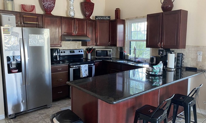 Indian Shores Condo | Huge Waterfront Condo With Heated Pool.