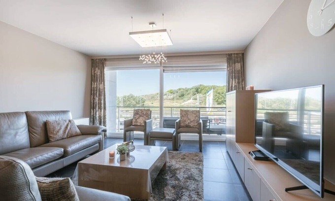 Bredene Apartment | Huswell - Bright seaside apartment with parking