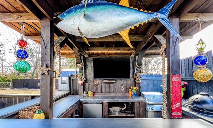 Fayetteville House | Ideally located home with enclosed yard, tiki bar, grill, smoker, & smart TVs
