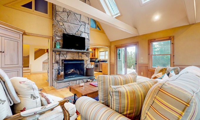 Arlington House | Ideally located spacious home with pool table, large deck, five fireplaces, W/D
