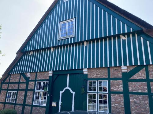 Haseldorf Apartment | Idylle unter Reet, gemütliche Ferienwohnug