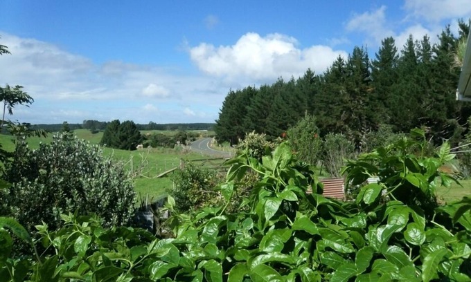 Kellys Bay House | Idyllic Pouto Peninsula. distant Water farm Views